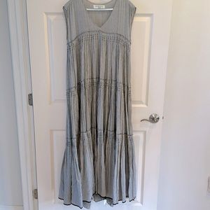 Urvashi Kaur from Anthropologie grey and black striped maxi dress